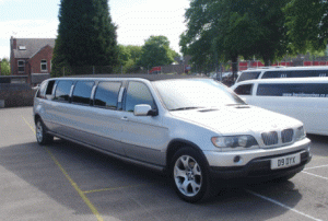 Chauffeur stretched silver BMW X5 limousine hire in london.