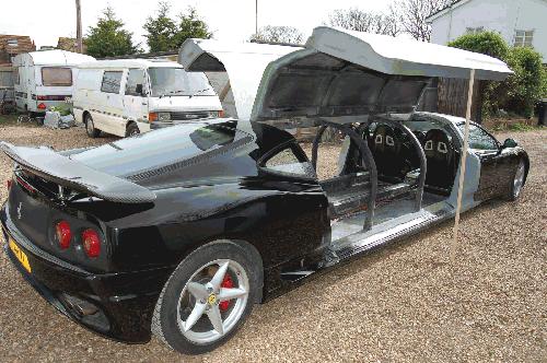 Chauffer driven stretched black Ferrari F1 360 limousine hire in the London with jet doors.