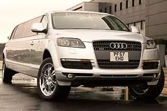 Chauffeur stretched silver Audi Q7 Sport limousine hire in London.