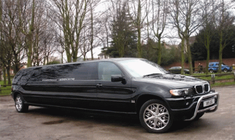 Chauffeur stretched black BMW X5 limo hire in London.