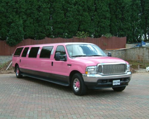 Chauffeur stretched pink Lincoln Navigator limousine hire in London