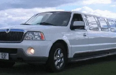 Chauffeur stretch white Lincoln Navigator limo hire in London