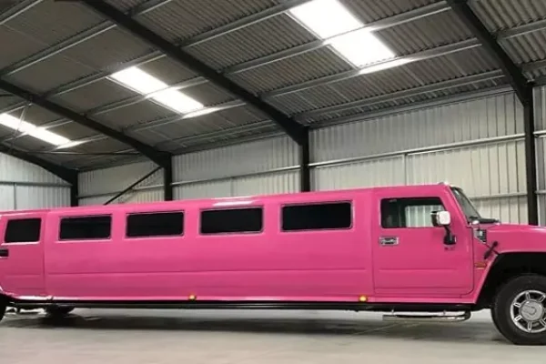 Chauffeur stretch pink Hummer H2 limousine hire in London, Essex, Kent, Surrey Hampshire, Berkshire, Hertfordshire, Buckinghamshire, Suffolk, Norfolk, Cambridgeshire, Bedfordshire and East of England.